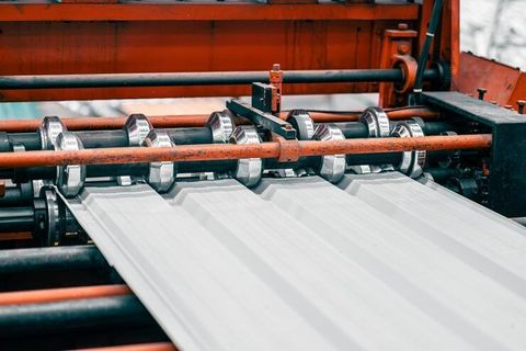 Roofing Sheet Manufacturing Explained: Production Process, Machinery & Construction Applications